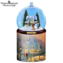 Load image into Gallery viewer, The Bradford Exchange Thomas Kinkade Scent-sational Holiday Treasures Flameless Snowglobe Candle Collection Issue #1 A Holiday Gathering Flameless Globe Candle Illuminated Holiday Glitter Globe with Scented Base Music and Hand-Painted Christmas Artwork 7"