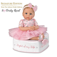 Load image into Gallery viewer, The Ashton - Drake Galleries Light of My Life So Truly Real® Lifelike Baby Girl Doll with Light Up Skirt and Ottoman Set Weighted Poseable RealTouch® Vinyl Skin by Doll Artist Linda Murray 18-inches - RCE Global Solutions