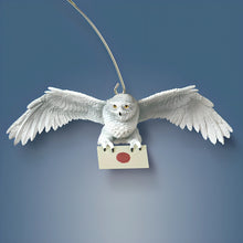 Load image into Gallery viewer, The Bradford Exchange HARRY POTTER HEDWIG Over HOGWARTS Illuminated Rotating Treetopper Hand-Painted HOGWARTS Castle and Sculpted HEDWIG with Snowy Feathers Golden Eyes and Snow-Dusted Mountain with Lights Music and Movement Christmas Decoration - RCE Global Solutions