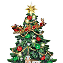 Load image into Gallery viewer, The Bradford Exchange Thomas Kinkade Studios “A Classic Christmas Tree” Tabletop Christmas Tree with Lights, Music & Motion Hand-Painted Holiday Village Christmas Décor 12.5-inches