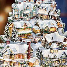 Load image into Gallery viewer, The Bradford Exchange Thomas Kinkade Songs Of The Season Illuminated Musical Tabletop Christmas Tree Decoration with 8 Fully Sculptural Buildings That Light Up With 8 Holiday Xmas Melodies 12"-Inches - RCE Global Solutions