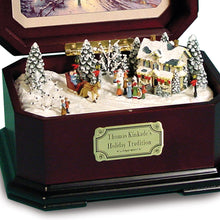 Load image into Gallery viewer, The Bradford Exchange Holiday Tradition Music Box Mahogany-Finished Plays "We Wish You a Merry Christmas" Picturesque Village Artwork Christmas Decoration by Thomas Kinkade 17 cm W - RCE Global Solutions