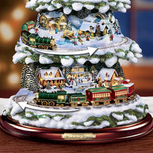 Load image into Gallery viewer, The Bradford Exchange Thomas Kinkade Wonderland Express Christmas Tree Decoration With Santa Sleigh Topper Lights Moving Train and Music With 8 Beloved Xmas Carols 16"-Inches - RCE Global Solutions