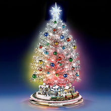 Load image into Gallery viewer, The Bradford Exchange Thomas Kinkade Silver Blessings Christmas Tree Handcrafted Tabletop Decoration With Color Changing Lights 30 Ornaments And a Holiday Village Encircled By a Moving Train Plays 8 Holiday Carols 17" - RCE Global Solutions