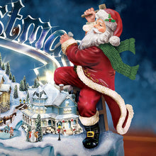 Load image into Gallery viewer, The Bradford Exchange Santa's Inspiration: Musical Illuminated Miniature Village Figurine Christmas Decoration by Thomas Kinkade 17-Inches - RCE Global Solutions
