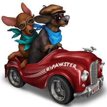 Load image into Gallery viewer, The Hamilton Collection Paws To The Pedal Dachshund Figurine Handcrafted Hand-Painted Doxie Dog Statue with Red Roadster Car Scarves Sunglasses and Woof Vanity Plate by Blake Jensen 3.5-Inches