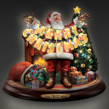 Load image into Gallery viewer, The Bradford Exchange Santas Holiday Wishes Sculpture Hand-Painted Hand-Cast Resin Figurine Christmas Decoration Plays 8 Holiday Carols Features Crackling Fireplace Effect Illuminated Tree and Merry Christmas Banner by Thomas Kinkade 10-inches - RCE Global Solutions