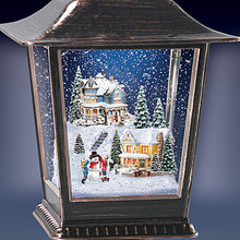 Load image into Gallery viewer, The Bradford Exchange Thomas Kinkade Holiday Continuous Snow Globe Illuminated Musical Black Lantern  Christmas Decoration Plays a Medley of 8 Holiday Songs With 24hr Timer 12-Inches - RCE Global Solutions