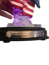 Load image into Gallery viewer, The Bradford Exchange Freedom's Light Endures Sculpture Collection Issue #2 Illuminated Handcrafted Crystal-Clear Resin Statue of Liberty with Real Fabric American Flag Patriotic Changing Colors Glossy Black Base with Etched Silvery Title Plaque 8-inches - RCE Global Solutions