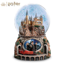 Load image into Gallery viewer, The Bradford Exchange Harry Potter Journey To Hogwarts Express Illuminated Musical Glitter Snow Globe Handmade Lighted Sculpture With Hermione Ron and Moving Train Plays Hedwigs Theme Song 7-Inches - RCE Global Solutions