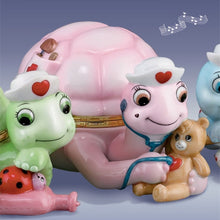 Load image into Gallery viewer, The Bradford Exchange "Loving" from Tender Loving Care Music Box Collection Issue #2 Limoges-style Music Box Sweet Turtle Nursing a Teddybear Plays "You Are My Sunshine" 5-inches - RCE Global Solutions