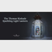 Load and play video in Gallery viewer, The Bradford Exchange Winter In A Wonderland Illuminated Sparkle Light Lantern with Snowman and Woodland Animals Victorian Christmas Decoration by Thomas Kinkade 17-Inches