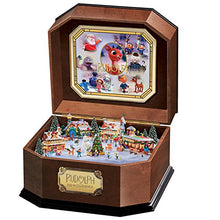Load image into Gallery viewer, The Bradford Exchange Rudolph The Red-Nosed Reindeer Music Box with Art and 3D North Pole Scene Inside - RCE Global Solutions
