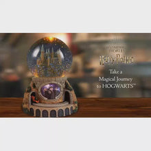 Load and play video in Gallery viewer, The Bradford Exchange Harry Potter Journey To Hogwarts Express Illuminated Musical Glitter Snow Globe Handmade Lighted Sculpture With Hermione Ron and Moving Train Plays Hedwigs Theme Song 7-Inches