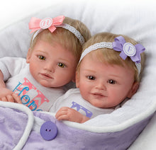 Load image into Gallery viewer, The Ashton - Drake Galleries Lifelike Poseable Twins "Hope and Faith" Baby Dolls Set with Purple Baby Bunting by Mayra Garza 14-inches - RCE Global Solutions