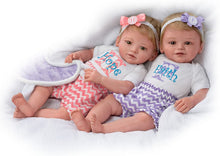 Load image into Gallery viewer, The Ashton - Drake Galleries Lifelike Poseable Twins "Hope and Faith" Baby Dolls Set with Purple Baby Bunting by Mayra Garza 14-inches - RCE Global Solutions