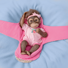 Load image into Gallery viewer, The Ashton - Drake Galleries Snuggle Suri Lifelike Baby Monkey Girl Doll With RealTouch® Vinyl Skin and Weighted Cloth Body Hand Applied Mohair Magnetic Pacifier Leopard Print Bunting 14"-inches - RCE Global Solutions