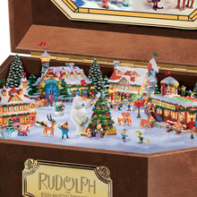 Load image into Gallery viewer, The Bradford Exchange Rudolph The Red-Nosed Reindeer Music Box with Art and 3D North Pole Scene Inside - RCE Global Solutions