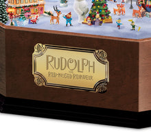 Load image into Gallery viewer, The Bradford Exchange Rudolph The Red-Nosed Reindeer Music Box with Art and 3D North Pole Scene Inside - RCE Global Solutions