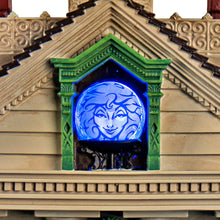 Load image into Gallery viewer, The Bradford Exchange Disney The Haunted Mansion Wall Clock Illuminated Glow-in-the-Dark Timepiece with Madame Leota and Hitchhiking Ghosts 13-inches
