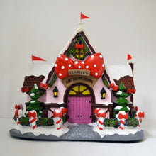 Load image into Gallery viewer, The Bradford Exchange Rudolph The Red-Nosed Reindeer Village Collection Issue #53 Clarice`s Holiday Bow Shoppe Christmas Village Display Illuminated Lighted Holiday Decor Hand Painted Sculpture 8.75-Inches
