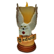 Load image into Gallery viewer, The Bradford Exchange Hedwig HARRY POTTER™ HOGWARTS House Candle Collection Issue # 7 High-Relief Sculpted LED Flameless Candles with House Mascots and Colors Remote-Controlled Illumination Magic (Included with Issue One) 7&quot; H x 3.5&quot; D
