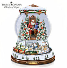 Load image into Gallery viewer, The Bradford Exchange Thomas Kinkade A Visit With Santa Illuminated Musical Christmas Snow Globe with Moving Train and 8 Holiday Songs 7&quot;-Inches - RCE Global Solutions
