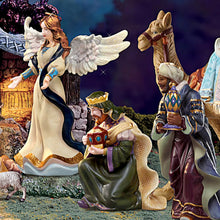 Load image into Gallery viewer, The Bradford Exchange Thomas Kinkade Nativity Collection Issue #4 King Melchoir With Angel Porcelain Figurine with 22K Gold Accents Handcrafted Christmas Nativity Collectible by Hawthorne Village 9-Inches
