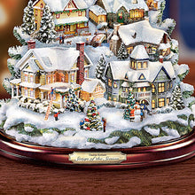 Load image into Gallery viewer, The Bradford Exchange Thomas Kinkade Songs Of The Season Illuminated Musical Tabletop Christmas Tree Decoration with 8 Fully Sculptural Buildings That Light Up With 8 Holiday Xmas Melodies 12&quot;-Inches
