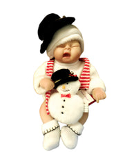 Load image into Gallery viewer, The Ashton-Drake Galleries Snow Ringle Baby Doll So Truly Lifelike Collectible Dolls with Snowman Plush Christmas Decorations by Sandy Faber 10-Inches - RCE Global Solutions
