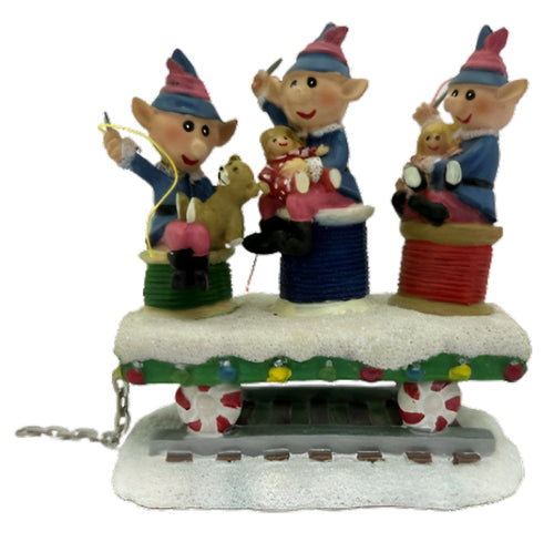 The Bradford Exchange Santas Elves Lighting The Holiday Path All Aboard The Rudolph® Express Collection Issue #7 A Delightful Celebration of Christmas Cheer Handcrafted & Hand Painted Christmas Decoration 4.5-inches
