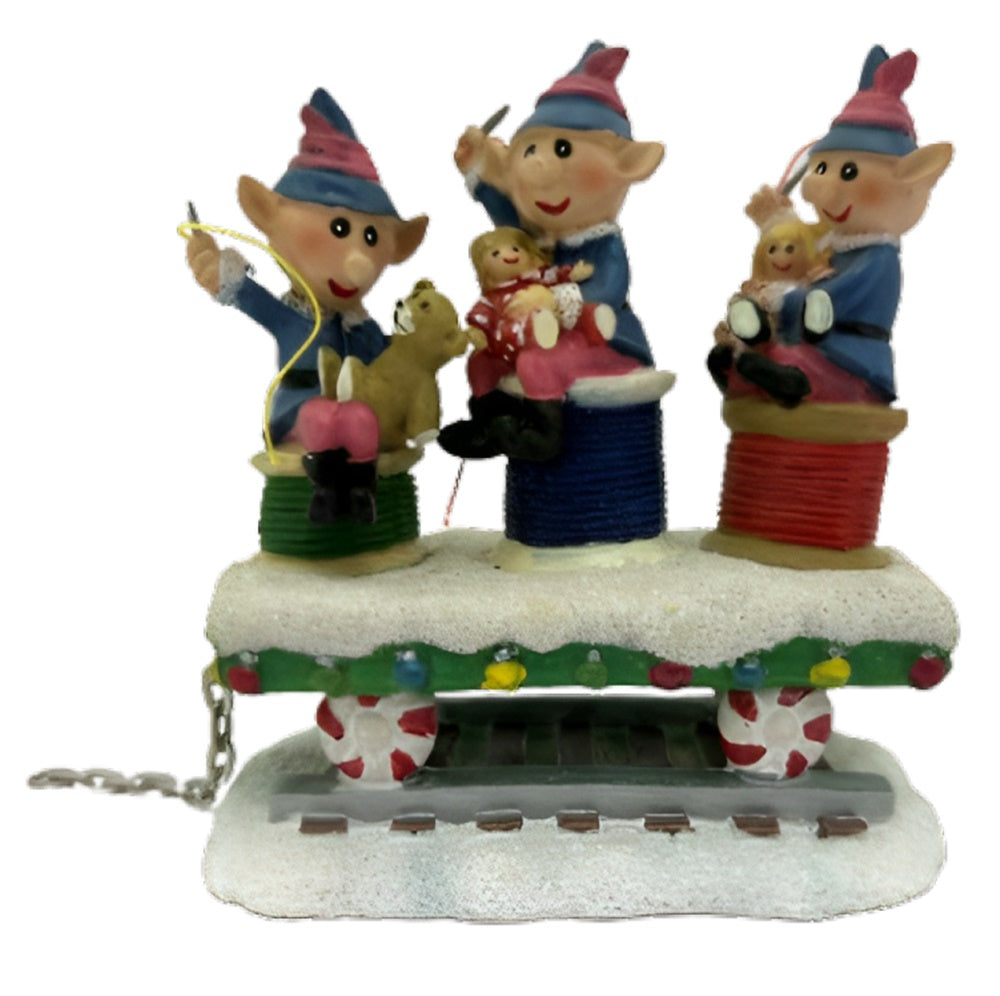 The Bradford Exchange Santas Elves Lighting The Holiday Path All Aboard The Rudolph® Express Collection Issue #7 A Delightful Celebration of Christmas Cheer Handcrafted & Hand Painted Christmas Decoration 4.5-inches - RCE Global Solutions