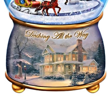 Load image into Gallery viewer, The Bradford Exchange Dashing All The Way Thomas Kinkade Holidays in Motion Snowglobe Collection Issue #3 Hand-Painted Rotating Sculptural Christmas decoration 5.75-inches
