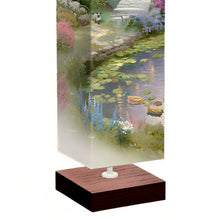 Load image into Gallery viewer, The Bradford Exchange Country Cottage Floor Lamp Serene Nature Art Lamp Expertly Reproduced Kinkade Artwork on All Sides Wood-Tone Base and Wrinkle-Resistant Fabric Shade Hands-Free Floor Switch Includes 2 FREE Energy-Saving Light Bulbs by Thomas Kinkade - RCE Global Solutions
