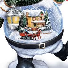 Load image into Gallery viewer, The Bradford Exchange Thomas Kinkade Snow Bellies Snowglobe Collection Issue #2 “Dashing Through The Snow” Illuminated Snowman Village Scene 7-inches
