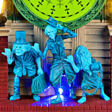 Load image into Gallery viewer, The Bradford Exchange Disney The Haunted Mansion Wall Clock Illuminated Glow-in-the-Dark Timepiece with Madame Leota and Hitchhiking Ghosts 13-inches
