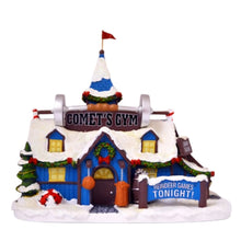 Load image into Gallery viewer, The Bradford Exchange Rudolph The Red-Nosed Reindeer Village Collection Issue #51: Coach Comet Reindeer Games Village Display Illuminated Lighted Holiday Decor Hand Painted Collectible Sculpture 8-inches
