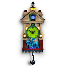 Load image into Gallery viewer, The Bradford Exchange Disney The Haunted Mansion Wall Clock Illuminated Glow-in-the-Dark Timepiece with Madame Leota and Hitchhiking Ghosts 13-inches

