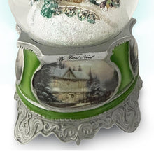 Load image into Gallery viewer, The Bradford Exchange The First Noel Christmas Musical Illuminated Snowglobe Decoration by Thomas Kinkade 5.25-inches - RCE Global Solutions
