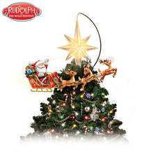 Load image into Gallery viewer, The Bradford Exchange Rudolph the Rednose Reindeer Christmas Tree Topper Rotates and Lights Up Santa and Sleigh Led by Rudolph and His Illuminated Nose with Glowing Star Holiday Decor 8.5&quot;-inches - RCE Global Solutions
