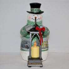 Load image into Gallery viewer, The Bradford Exchange Thomas Kinkade Warm Welcome Snowman Candle Issue #5 Lighted Musical Snowman Lantern Warm Wishes Tabletop Centerpiece Collection 7-inches - RCE Global Solutions
