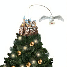 Load image into Gallery viewer, The Bradford Exchange HARRY POTTER HEDWIG Over HOGWARTS Illuminated Rotating Treetopper Hand-Painted HOGWARTS Castle and Sculpted HEDWIG with Snowy Feathers Golden Eyes and Snow-Dusted Mountain with Lights Music and Movement Christmas Decoration - RCE Global Solutions
