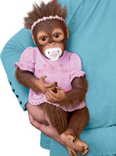 Load image into Gallery viewer, The Ashton - Drake Galleries Cooing Cora Baby Girl Monkey Doll Coos and Breathes So Truly Real® Lifelike Hand Applied Mohair RealTouch® Vinyl Skin Fully Weighted and Poseable for Realism 18-inches
