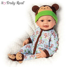 Load image into Gallery viewer, The Ashton-Drake Galleries Lucas Monkey-Themed Lifelike Baby Doll RealTouch® Vinyl Poseable Weighted Cloth Body Hand-rooted Hair by Linda Murray 18-inches - RCE Global Solutions
