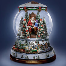 Load image into Gallery viewer, The Bradford Exchange Thomas Kinkade A Visit With Santa Illuminated Musical Christmas Snow Globe with Moving Train and 8 Holiday Songs 7&quot;-Inches - RCE Global Solutions
