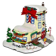 Load image into Gallery viewer, The Bradford Exchange Rudolph The Red-Nosed Reindeer Village Collection Issue #27 Christmas Town Cobbler Village Display Illuminated Lighted Holiday Decor Hand Painted Sculpture 8.75-Inches
