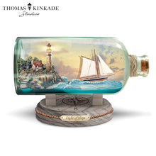 Load image into Gallery viewer, The Bradford Exchange Light of Hope Illuminated Ship-In-A-Bottle Sculpture Handcrafted Seascape Art with Illuminating Lighthouse Clear Glass Bottle and Compass Base by Thomas Kinkade 8.75&quot; L x 5.5&quot; H x 4.75&quot; D - RCE Global Solutions
