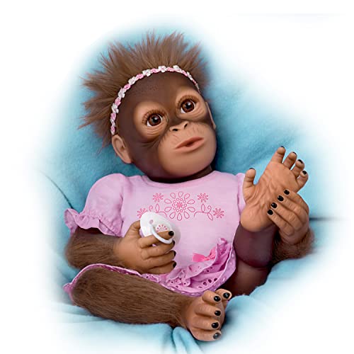 The Ashton - Drake Galleries Cooing Cora Baby Girl Monkey Doll Coos and Breathes So Truly Real® Lifelike Hand Applied Mohair RealTouch® Vinyl Skin Fully Weighted and Poseable for Realism 18-inches
