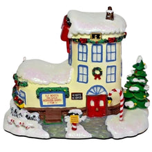 Load image into Gallery viewer, The Bradford Exchange Rudolph The Red-Nosed Reindeer Village Collection Issue #27 Christmas Town Cobbler Village Display Illuminated Lighted Holiday Decor Hand Painted Sculpture 8.75-Inches
