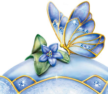 Load image into Gallery viewer, The Bradford Exchange Whispering Wings Porcelain Sapphire Glass Jeweled Music Box With Butterfly Handle Landing Upon a Flower by Artist Lena Liu Plays the Song On The Wings of Love 4&quot;-Inches - RCE Global Solutions
